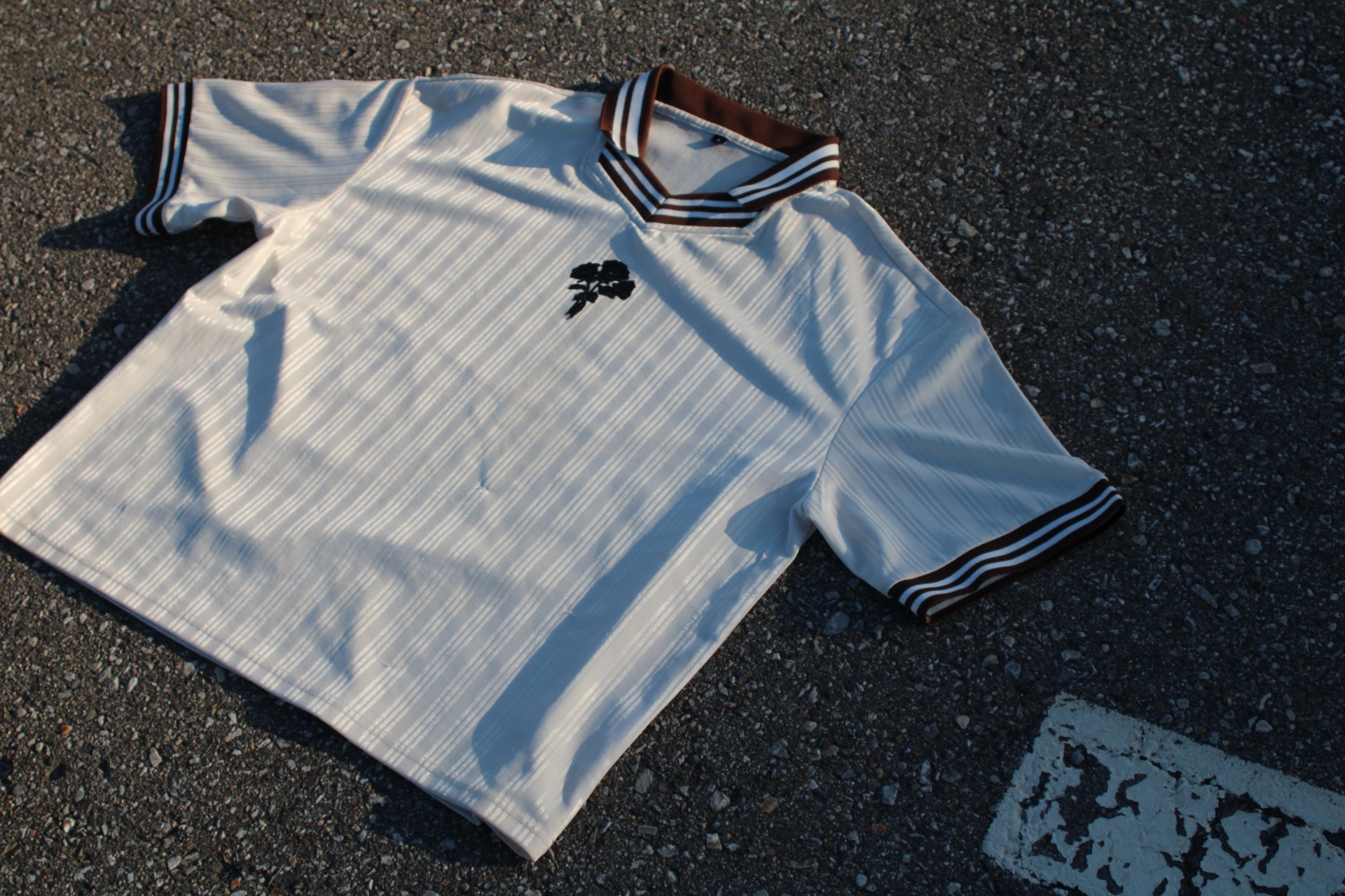 Satin Pinstripe Polo — front with embroidered black rose